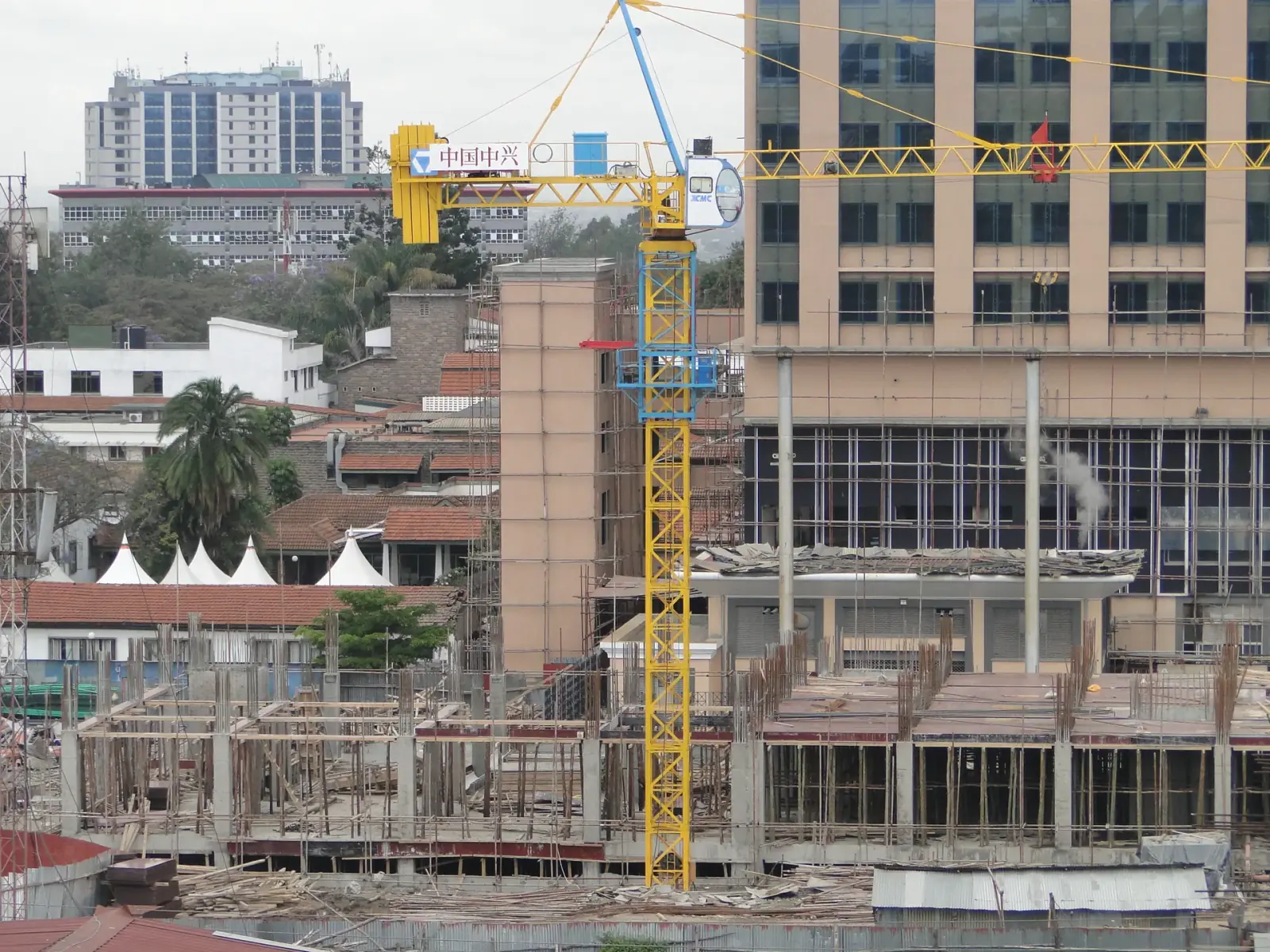 Construction cranes and scaffolding on a build site