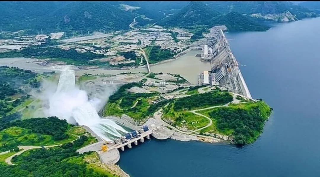Aerial view of the Grand Ethiopian Renaissance Dam with its spillway flowing into the Blue Nile