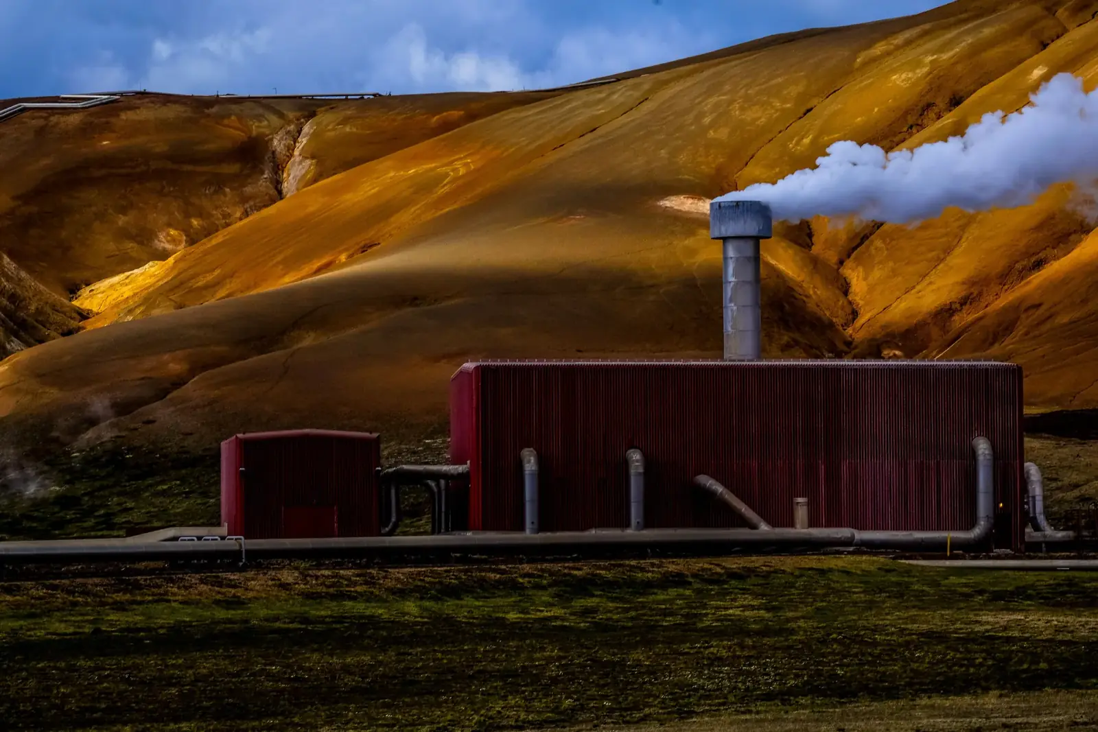 A geothermal power plant with steam rising in Kenya's Rift Valley