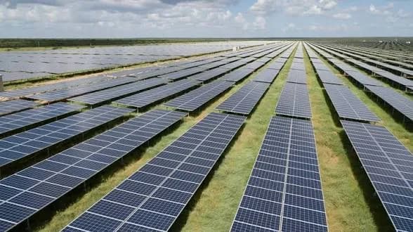 Rows of solar panels stretching across a Kenyan site