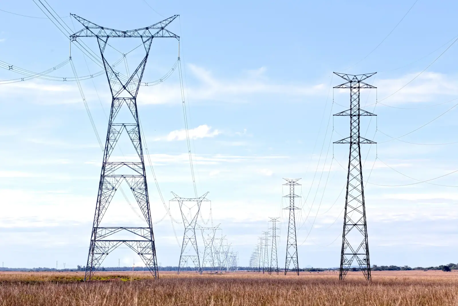 High-voltage transmission pylons crossing Kenyan terrain