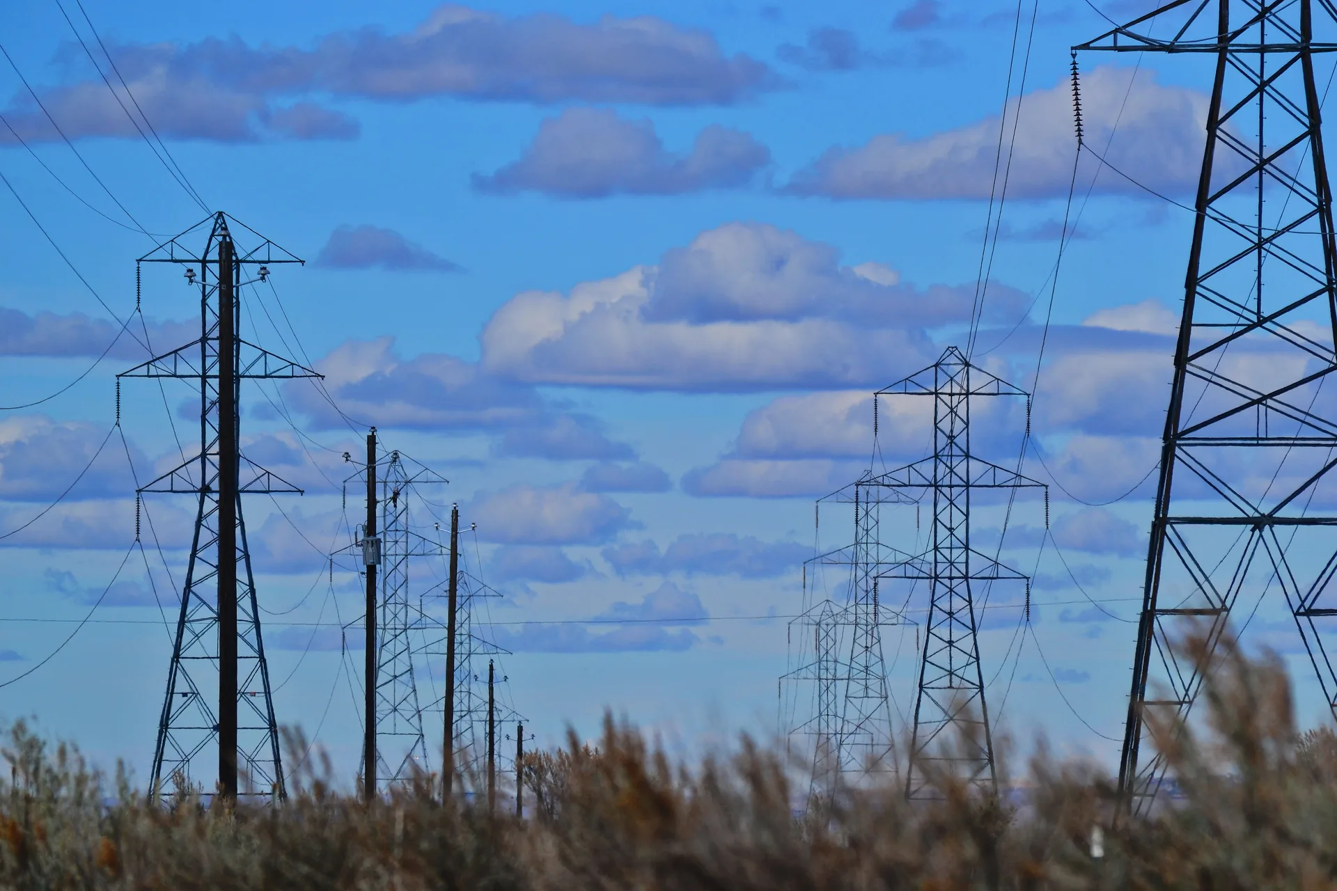 High-voltage transmission pylons crossing Kenyan terrain