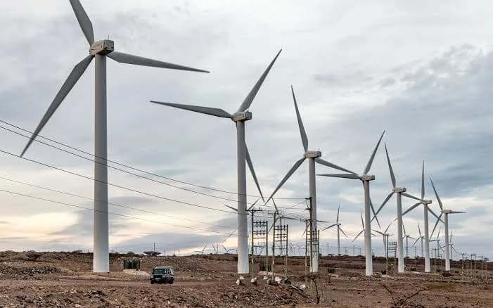 Wind turbines generating power in rural Kenya