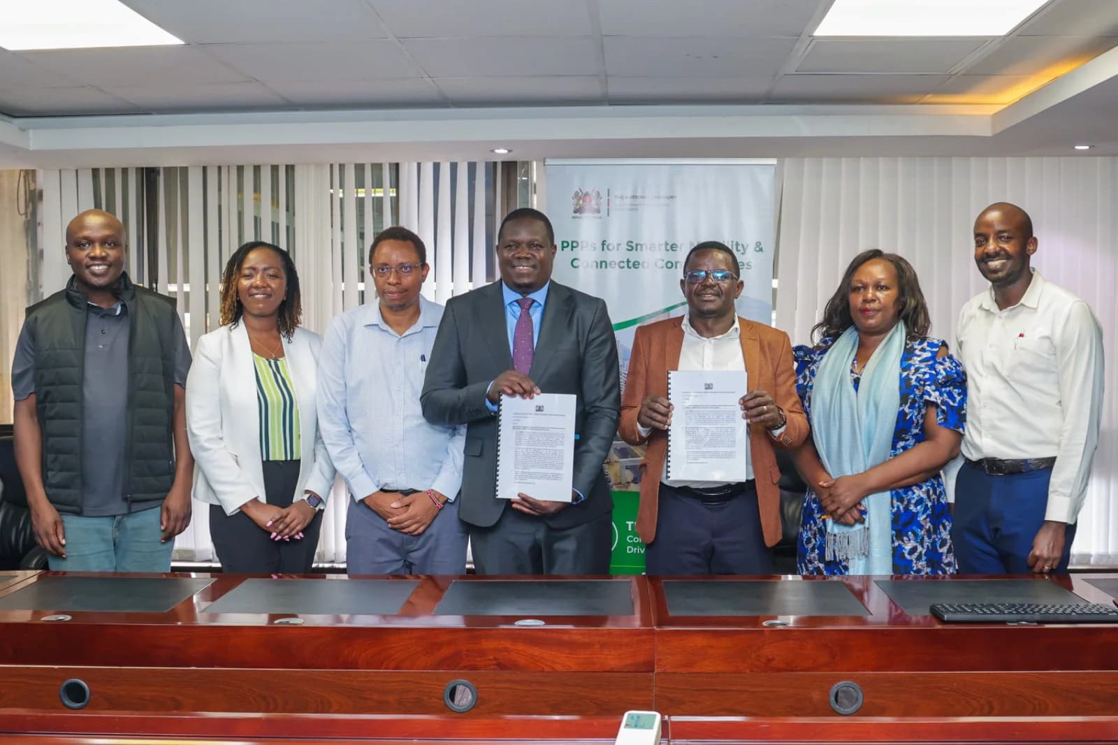 Group photo of KoTDA and National Treasury officials at the signing